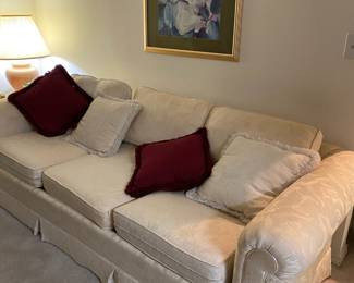 White/Floral Upholstered Couch
