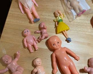 Assortment of Celluloid, Early Plastic Dolls , Jointed Doll with Removable Plastic Clothes, 1950's Sitting Rubber Baby Doll