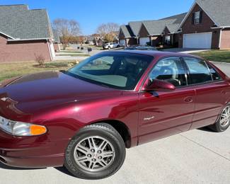 2001 Buick Regal LS with only 49,539 miles (VIN 2G4WB55K611330643)
Red exterior/grey leather interior