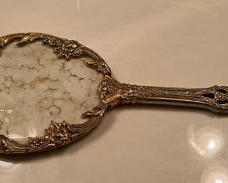 Vintage brass hand mirror