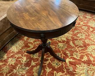 G40 - $40 - Round side table. Measures 22" round x 27" tall.