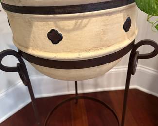 H12 - $60 - Iron Base and Decorative Planter. Measures 17.5" wide x 36" tall.