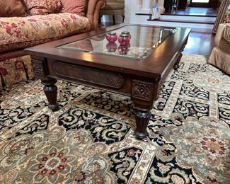 G23 - $95. Glass Top Coffee Table. Measures 30" wide x 53" long x 17" tall. Lexington Home brand.