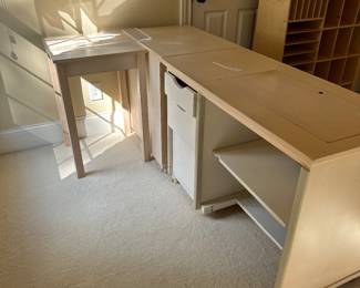 G15 - $275. Moves in 3 pieces - sewing desk with electric lift table for machine. Square pc measures 20" x 30" tall. Cabinet with drawers measures 20" x 28" x 30.5" tall. Cabinet for machine measures 20" x 42" x 30.5" tall.