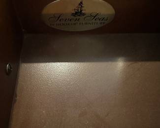 G37 - $60 - Seven Seas by Hooker Furniture small table. Measures 11" deep x 28" long x 31.5" tall. Has single drawer.