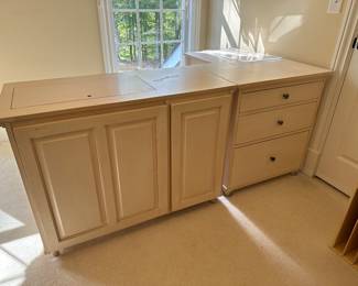 R15 - $275. Moves in 3 pieces - sewing desk with electric lift table for machine. Square pc measures 20" x 30" tall. Cabinet with drawers measures 20" x 28" x 30.5" tall. Cabinet for machine measures 20" x 42" x 30.5" tall.