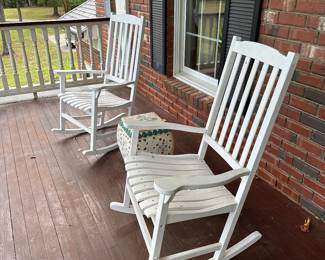 G3 - $40 Each. 2 available - White rocking Adirondack chairs.