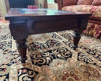 G23 - $95. Glass Top Coffee Table. Measures 30" wide x 53" long x 17" tall. Lexington Home brand.