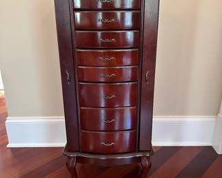 G27 - $75 - Jewelry Box with drawers and doors on the side that open for hanging necklaces. Mirror opens out when top lifts up.