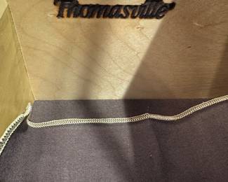 G36 - $2000. SET - Thomasville Mahogany Dining Room Table with 2 captains chairs, 4 regular. 2 leaves. Table Pads. AND. Large lighted china cabinet with glass shelves. Overall in excellent condition - beautiful wood with inlay.