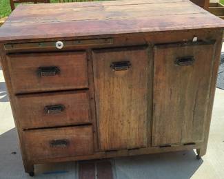 1800s antique storage piece. Comes with butcher block top to use as a kitchen island