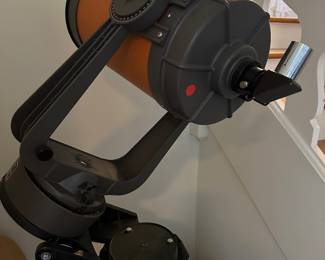 Large Telescope, I believe it's called a celestial?  Paperwork attached, it will be available.