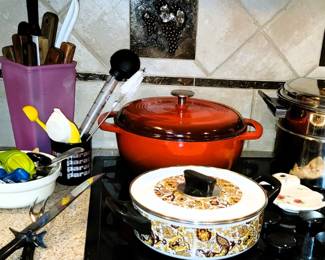 Enamel Dutch oven (sold), ice bucket, tea kettle (sold), pots and pans