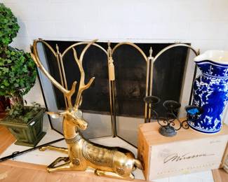 Large brass reindeer, faux plants and large decorative pitcher