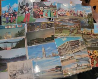 100s and 100s of old postcards, including linen and photographic.  Disney, Airplanes, Cars, city landmarks and more