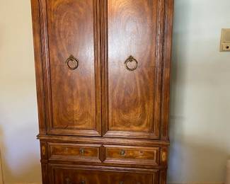 Wardrobe Cabinet with drawers and mirror inside. 