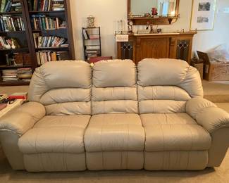 Faux Leather Sofa 71/2 ft w.  has manual foot rest extension on both sides (with loveseat and recliner) 