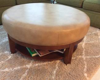 38" round genuine leather ottoman with shelf