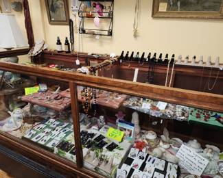 Display Case. 6' and has a base made with rollers especially made for case, it raises it up. Has top glass but found it more interactive without it
