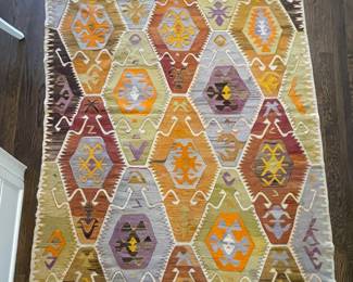 Hand-Woven Turkish Kilim Rug. Measures 9' 6" x 5'. Photo 1 of 3.