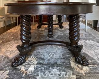 Vintage Walnut Finish 54" Round Jacobean Style Dining Table with Barely Twist Legs and Claw Feet. Extends to 93" with 4 Leaves. 29" H with 4" Apron. Photo 5 of 9.
