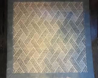 Mandarine Home Sourced Fiberworks Sisal Rug with Wide Grey Leather Banding. Measures 48" x 48". Photo 1 of 2.