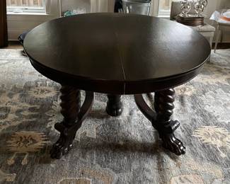 Vintage Walnut Finish 54" Round Jacobean Style Dining Table with Barely Twist Legs and Claw Feet. Extends to 93" with 4 Leaves. 29" H with 4" Apron. Photo 9 of 9.