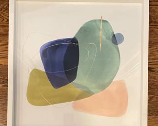 White Framed Graphic Art. Measures 20" x 20."