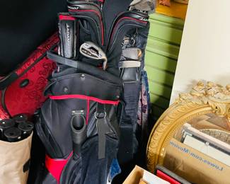 2 sets of golf clubs