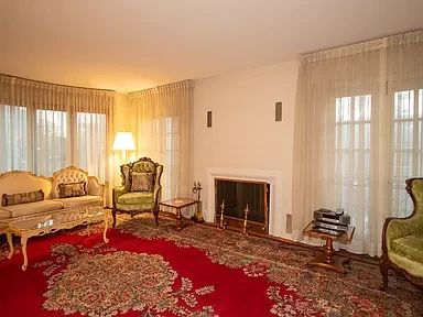 Living Room,  14'  Red Kirman Rug 