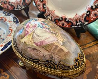 Large 19th C Limoges egg on gilt bronze stand