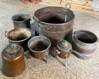 Large collection of antique copper pots