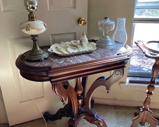 Lots of marble topped Eastlake furniture.