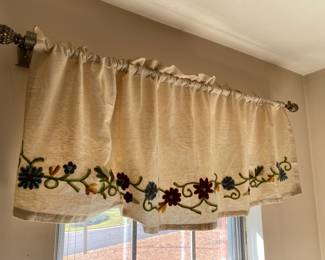 Pretty crewel style drapery.