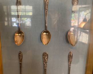 Framed Sterling spoons.