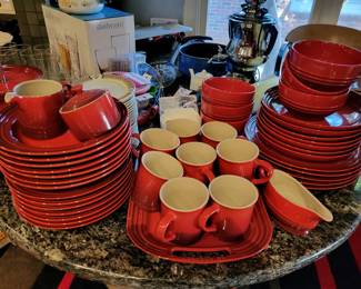 Very nice large set of Le Creuset designer dishes.