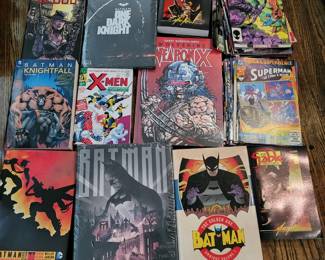 Various Batman books and detective comics .