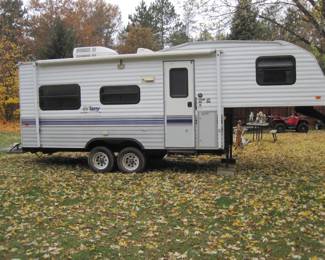 21' Terry 5th wheel. 1/2 ton tow-able (@4200 lbs). No leaks - stored in pole barn when not in use.