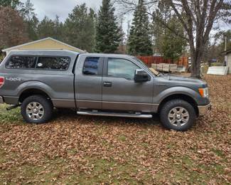 2009 F150 4X4 XLT with Topper (separate picture), 5th wheel setup . In the past year, truck has new tires, front struts/springs, lower ball joints, upper control arms, fuel pump relay/wiring, and alignment.