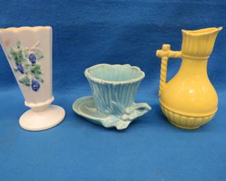 Lot 350. Three pieces of McCoy art pottery