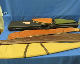 Lot 147. Six gun cases, one hard case for a long gun, three soft cases for long guns, and two soft pistol cases