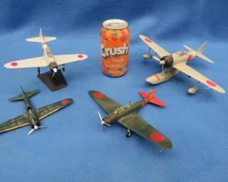 Lot 342. Plastic Japanese floatplane and three Japanese die-cast planes.&nbsp; Condition as shown.