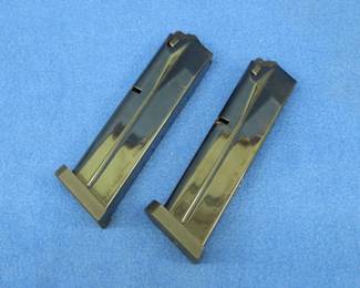 Lot 174. Two 17-round Beretta 90 series magazines