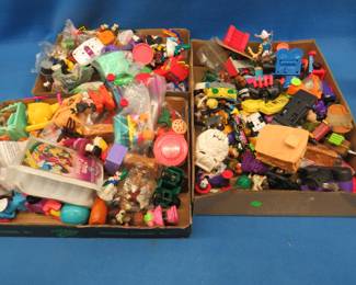 Lot 272. Three flats full of toys, figurines, etc.