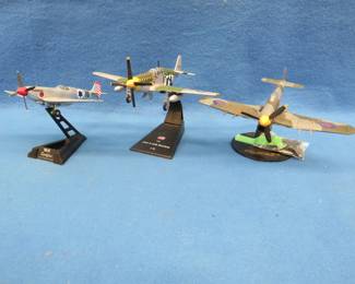Lot 230. Three WW2 die-cast planes with stands.&nbsp; 1:72 scale.