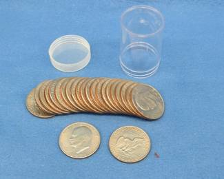 Lot 139. 23 Eisenhower dollar coins in a plastic holder