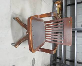 Lot 102. Vintage solid oak swiveling/rocking office chair