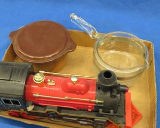 Lot 276. Two pieces of Pyrex and a battery-powered train engine