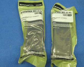 Lot 205. Two 30-round 5.56 magazines