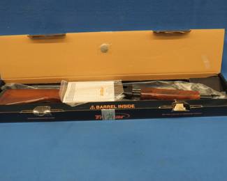 Lot 22. NIB TriStar Model Cobra Wood 20-gauge pump-action shotgun. Imp. Mod. and full choke tubes. SN 21P2001655 with the factory box.